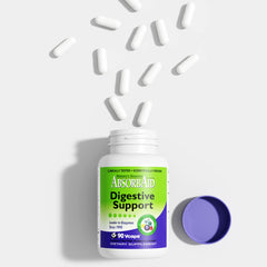 Close-up of AbsorbAid capsules outside the bottle