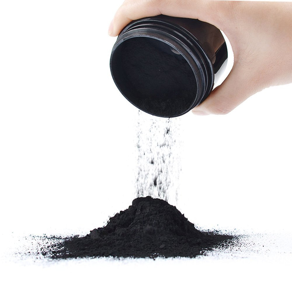 Close-up of activated coconut charcoal powder texture