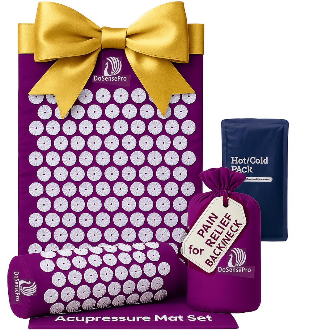 Purple acupressure mat with pillow set on white background