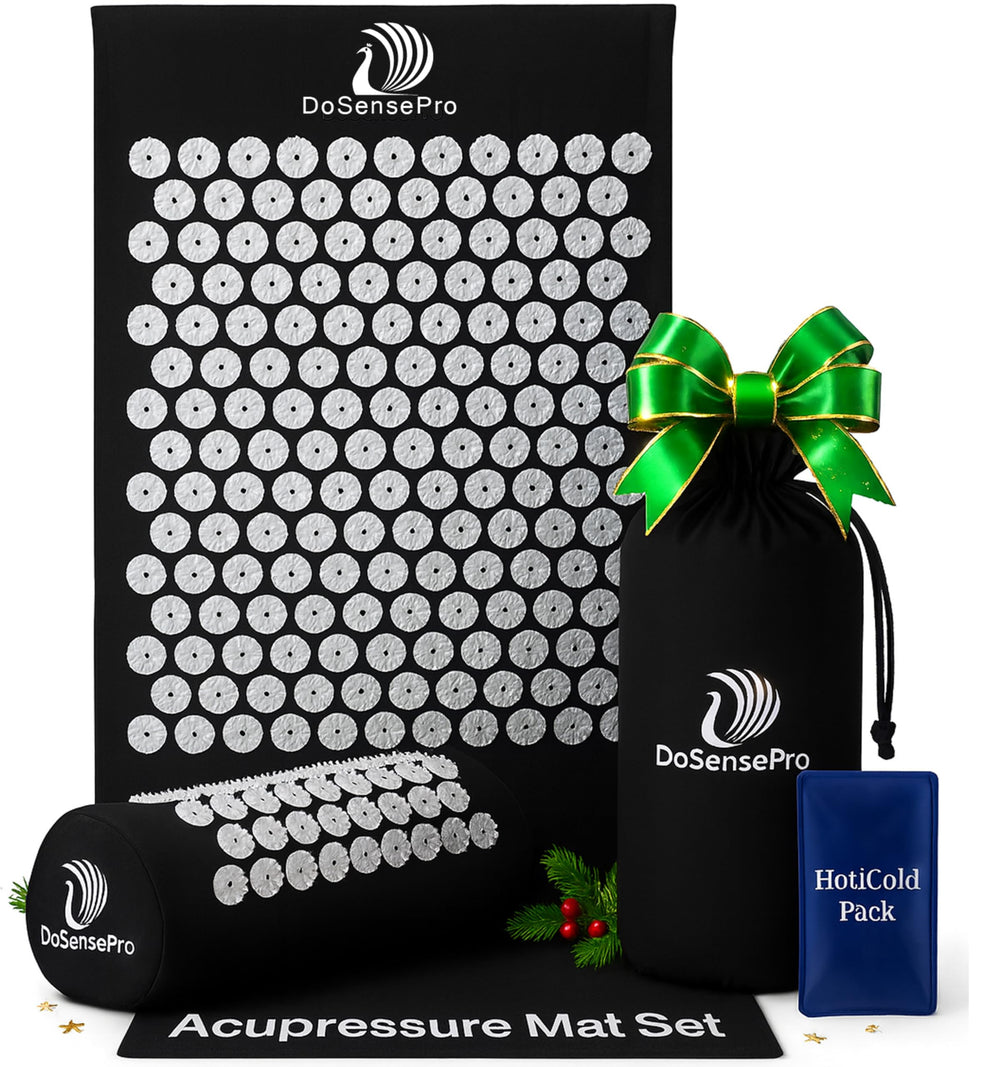 Acupressure mat and pillow set in black laid flat