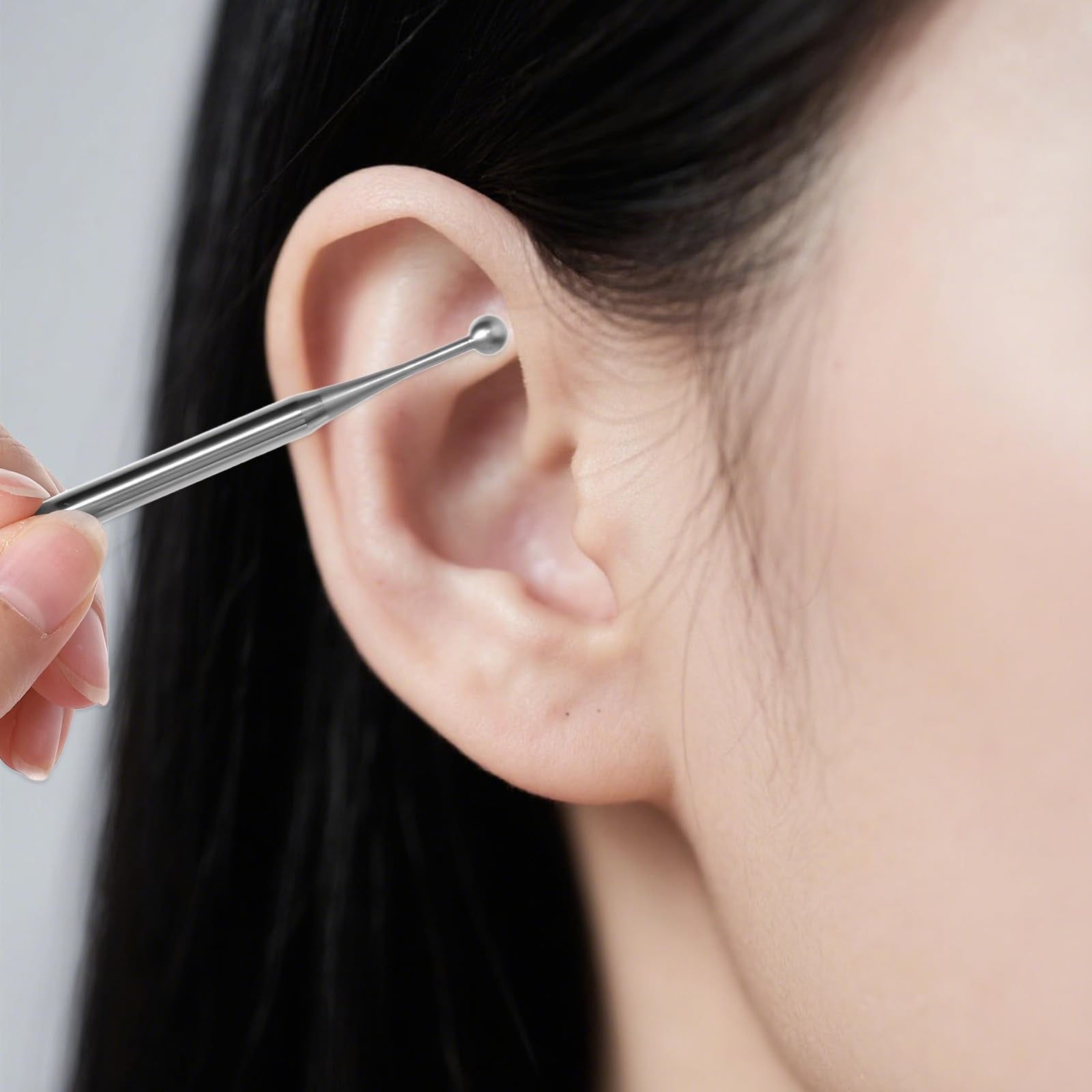 Ergonomic grip on stainless steel acupuncture pen