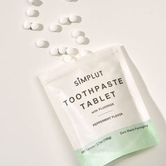 Adults using chewable toothpaste tablets for brushing
