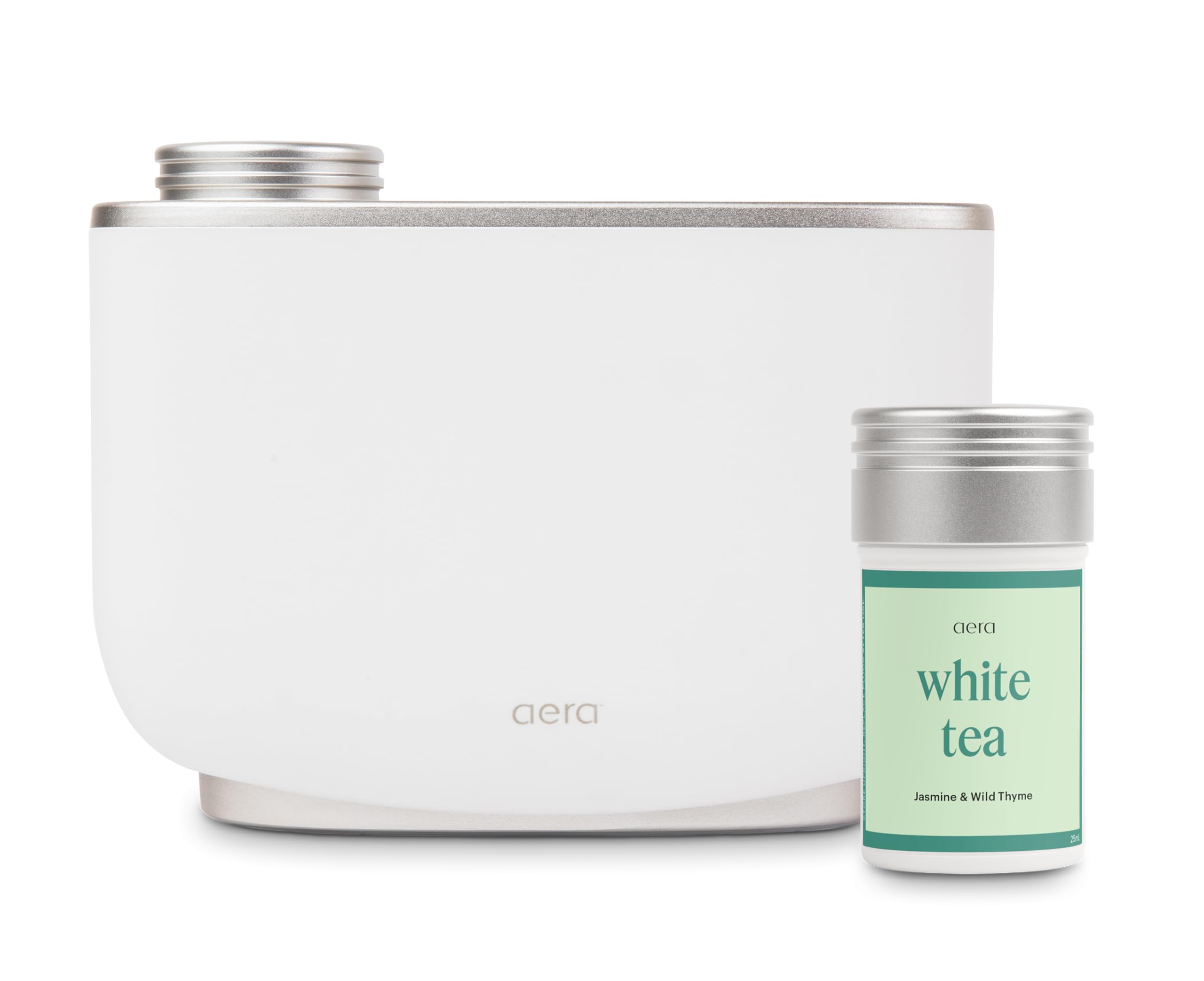 Aera essential oil diffuser with White Tea bundle in a modern living room