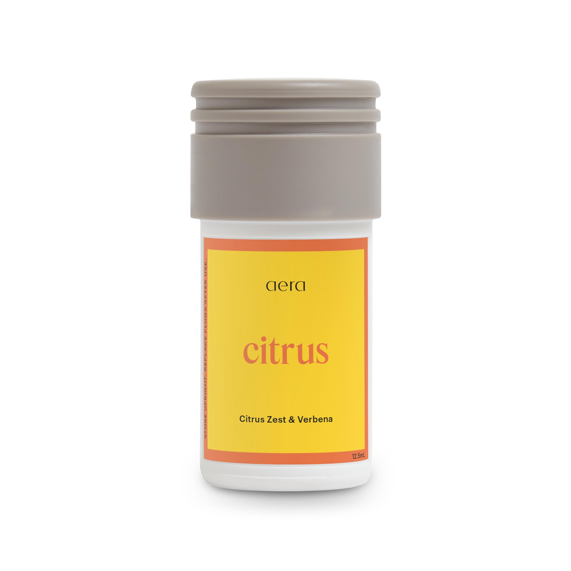 Aera Mini Citrus essential oil bottle and packaging