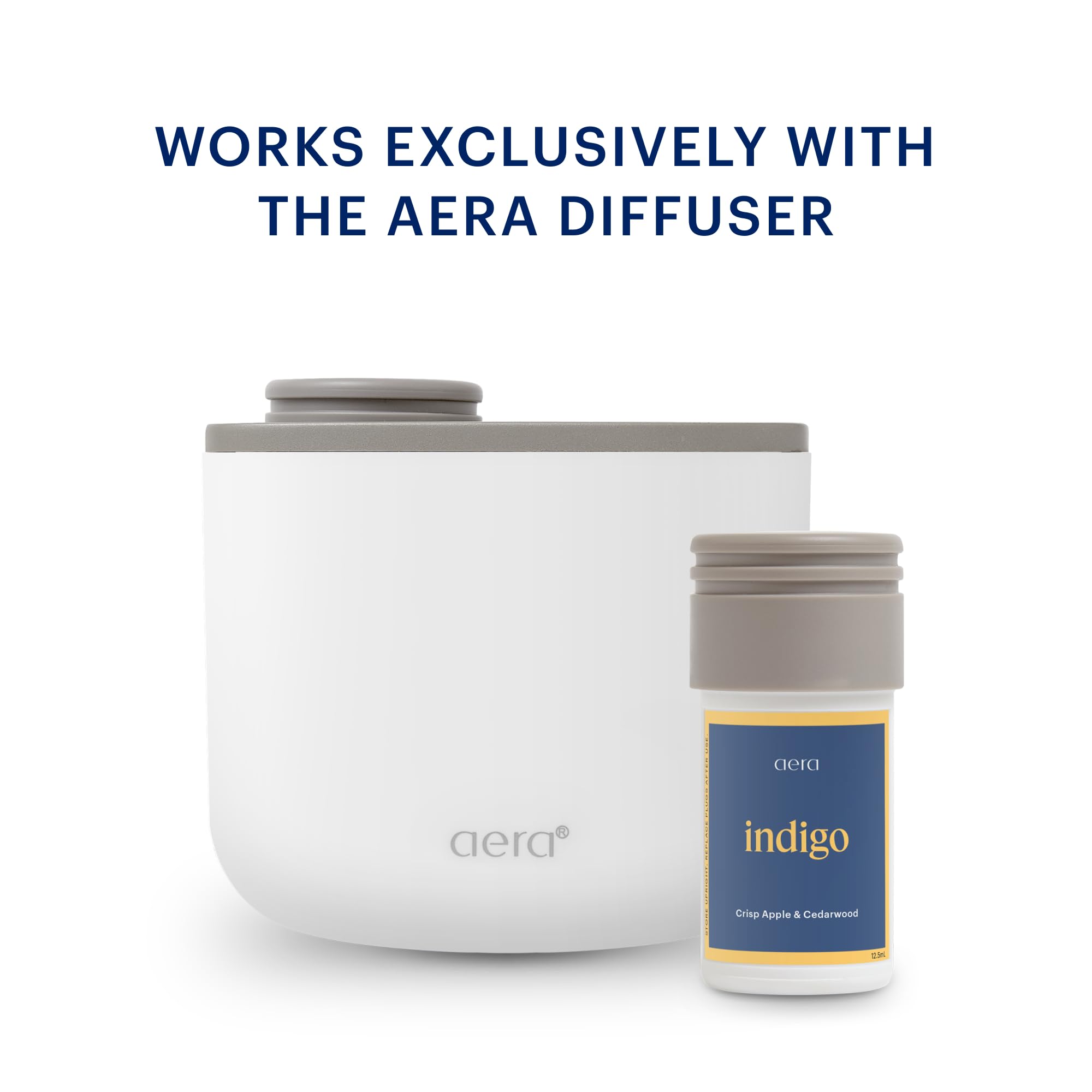 Aera Mini Indigo capsule next to smartphone for compact size and portability