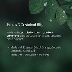 Bottle displaying essential oils like orange and clove bud