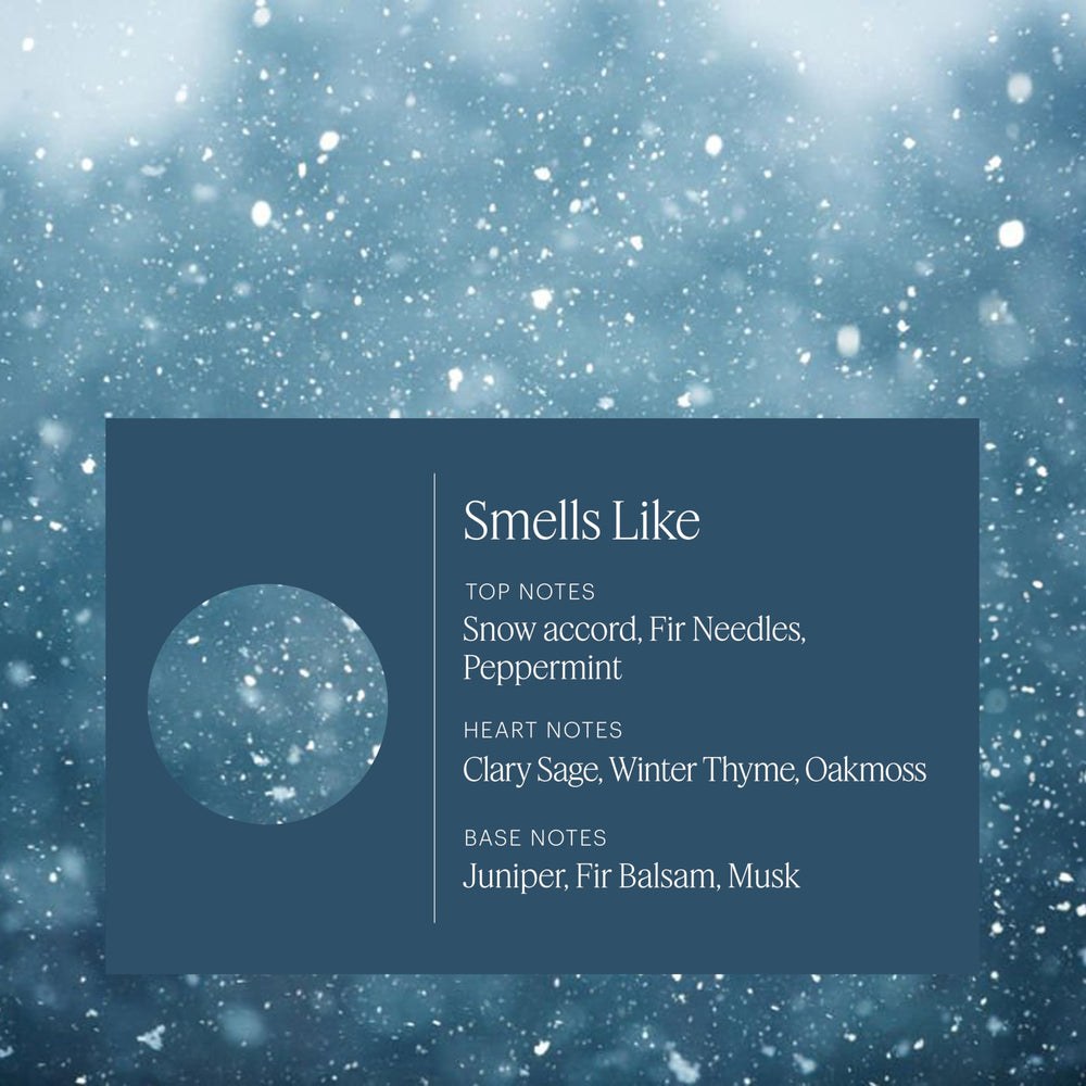 Close-up of Snowfall refill label featuring winter pine design