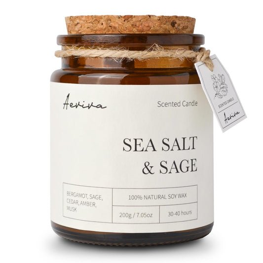 Aeviva Sea Salt & Sage scented candle in amber jar with wooden wick