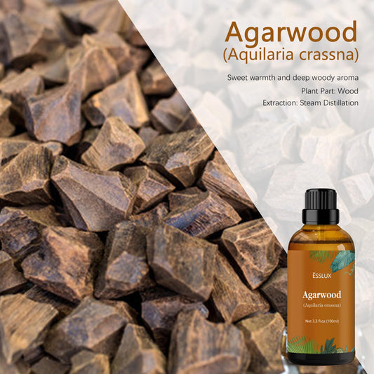 Close-up of amber glass bottle of agarwood essential oil with dropper