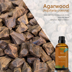 Close-up of amber glass bottle of agarwood essential oil with dropper