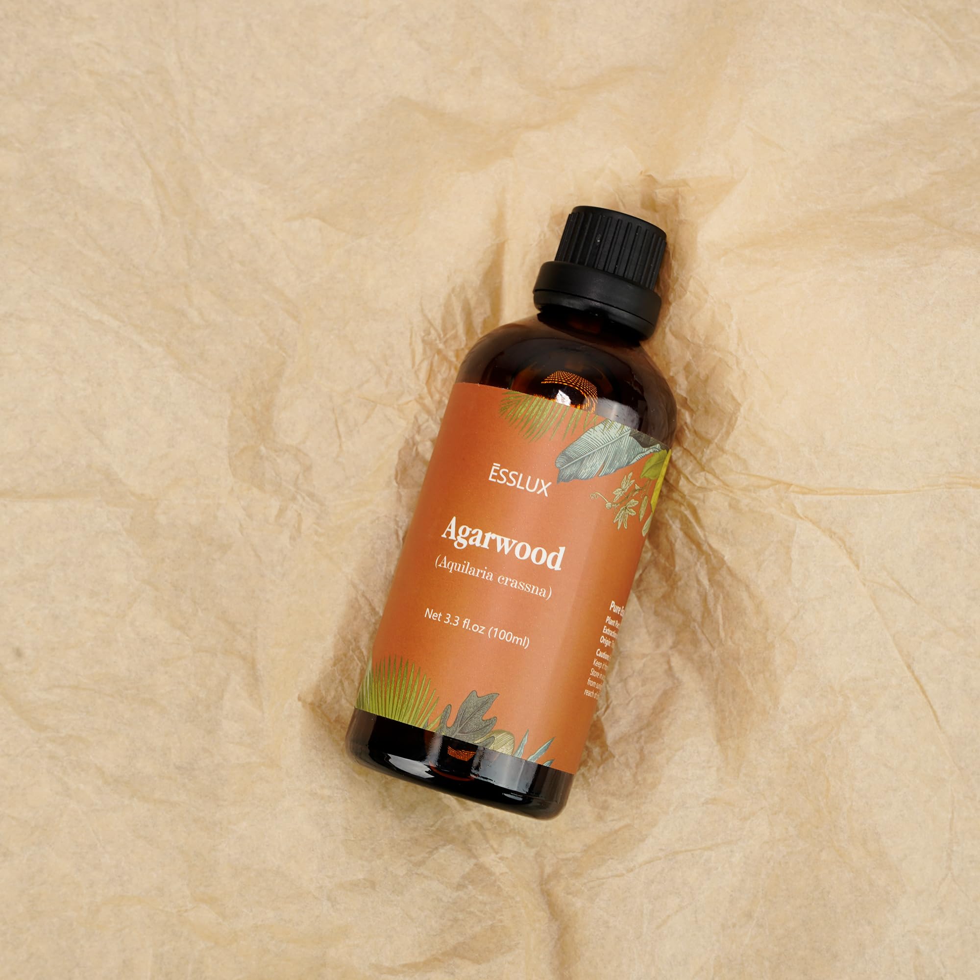 ESSLUX Agarwood essential oil 100 ml bottle label and packaging