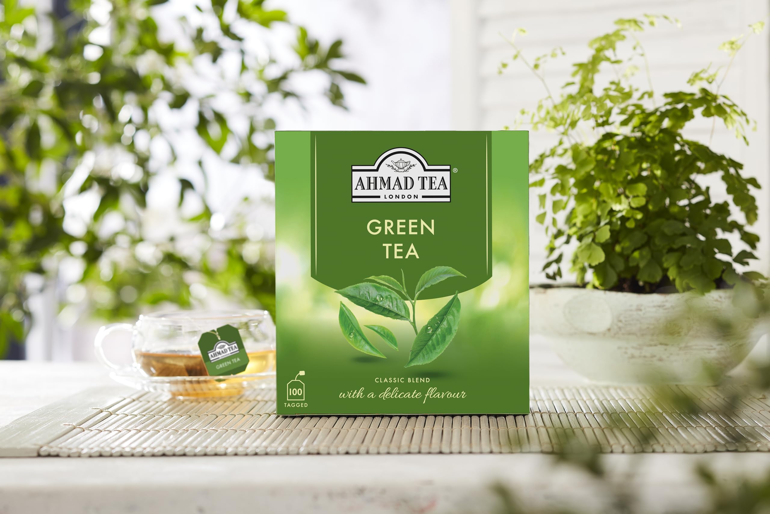 Cup of green tea with lemon slice