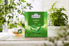 Cup of green tea with lemon slice