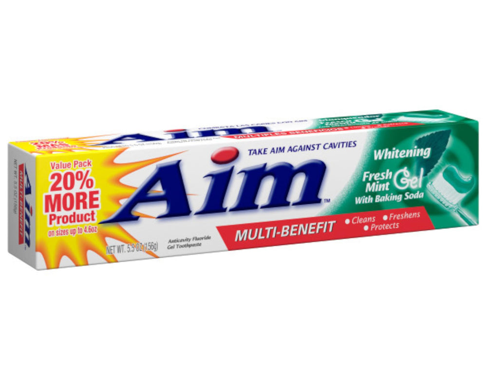 Toothbrush with Aim Fresh Mint toothpaste applied