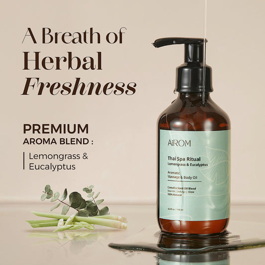 Close-up of massage oil bottle showing lemongrass and eucalyptus imagery
