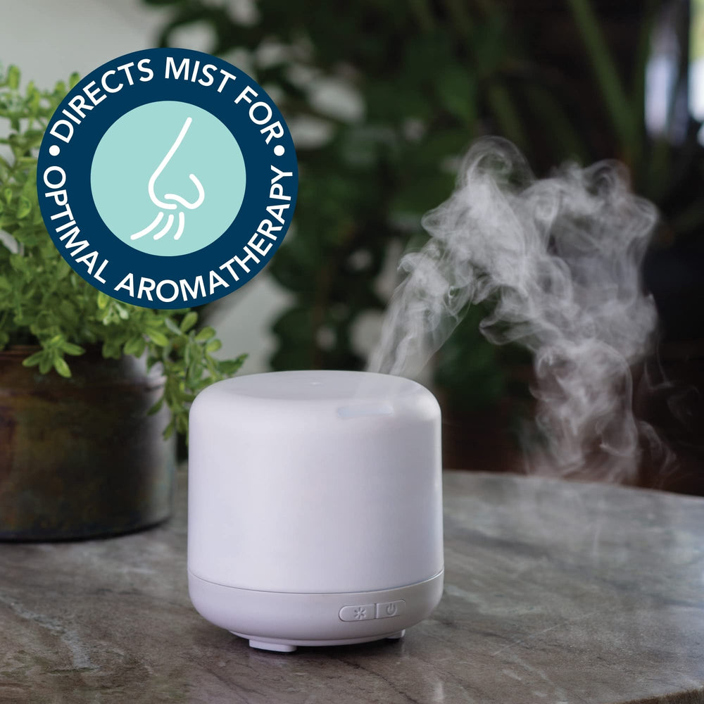 Airomé compact diffuser base and vessel shown for easy tabletop use.