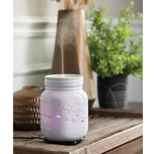 Close-up of Airome Mason Jar diffuser highlighting the LED lights