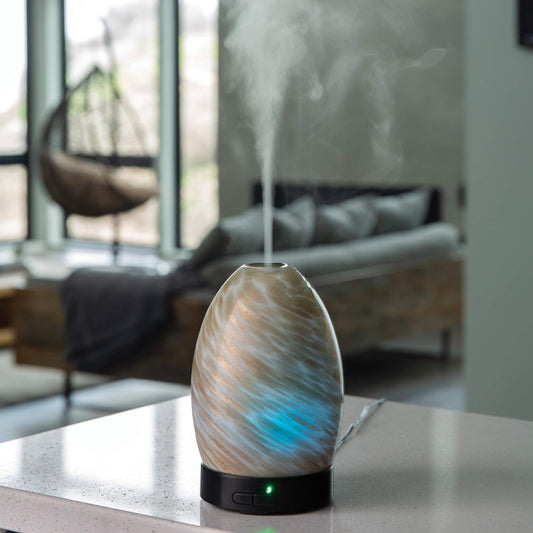 Airome Sparkling Sands Diffuser, side view showing hand-blown glass