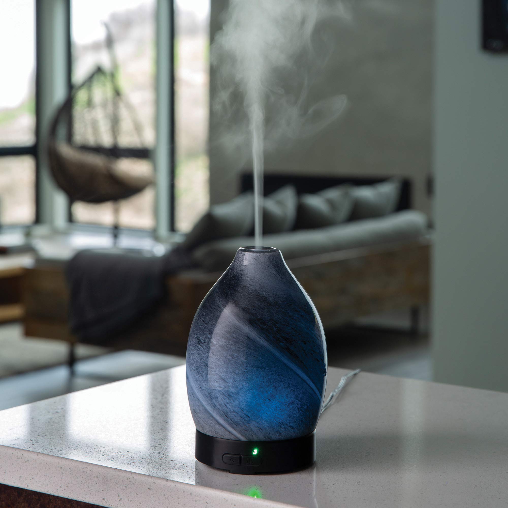 Diffuser displaying 8 LED color options for ambient lighting