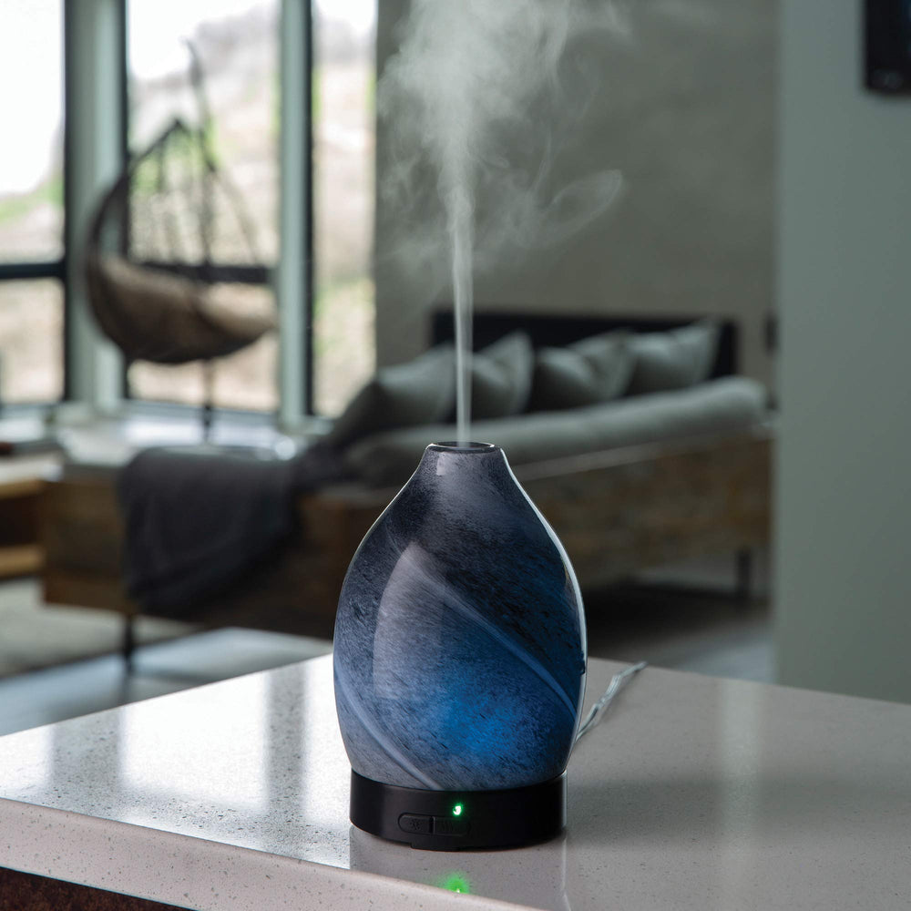 Diffuser displaying 8 LED color options for ambient lighting