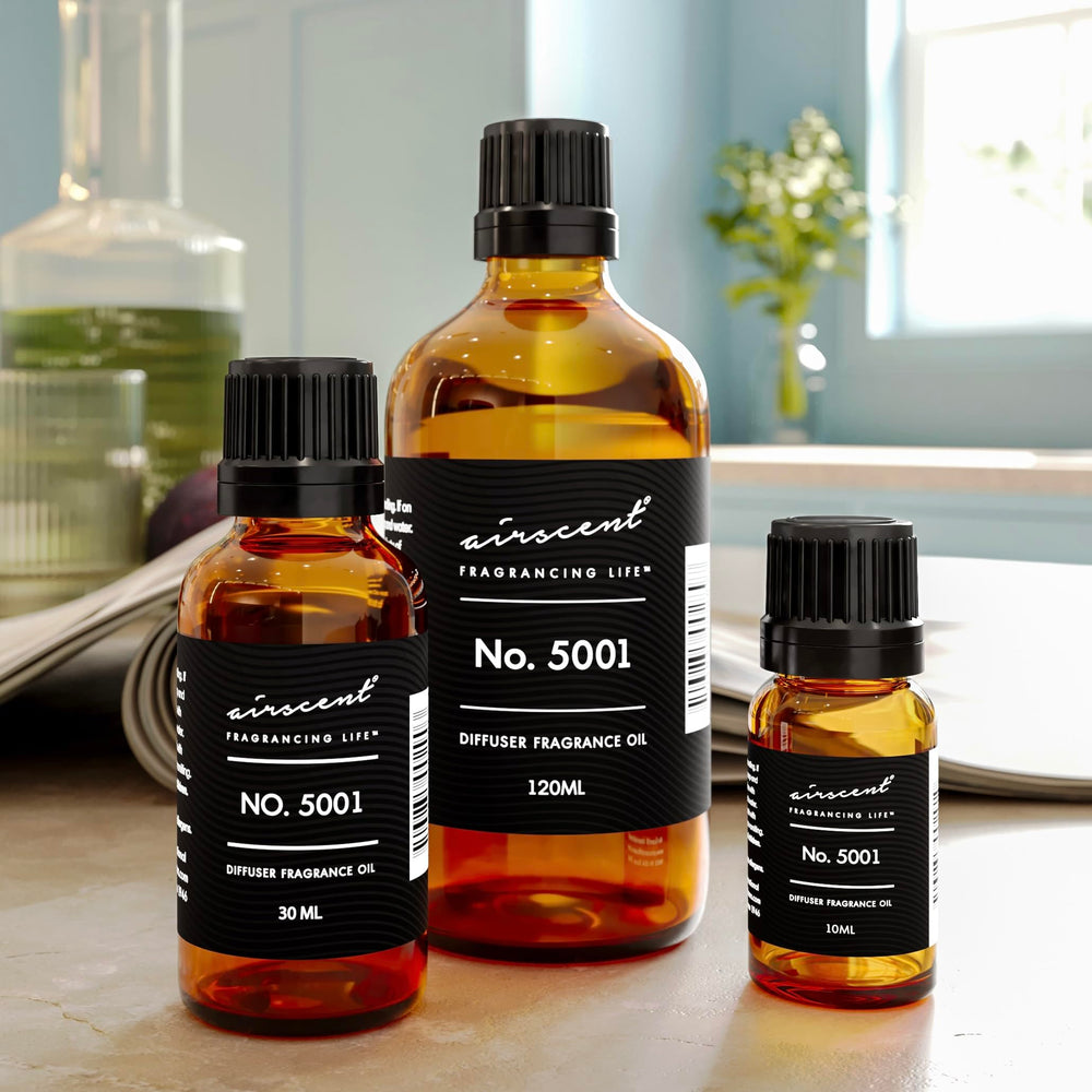 DIY crafting setup showing candles/soaps with AirScent fragrance oil