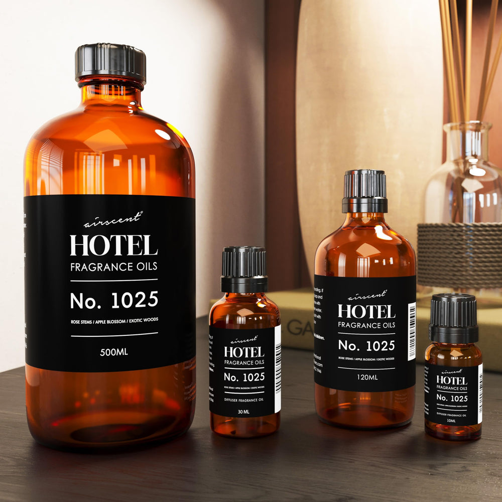 AirScent bottle beside apple and rose illustrating floral and fruity notes