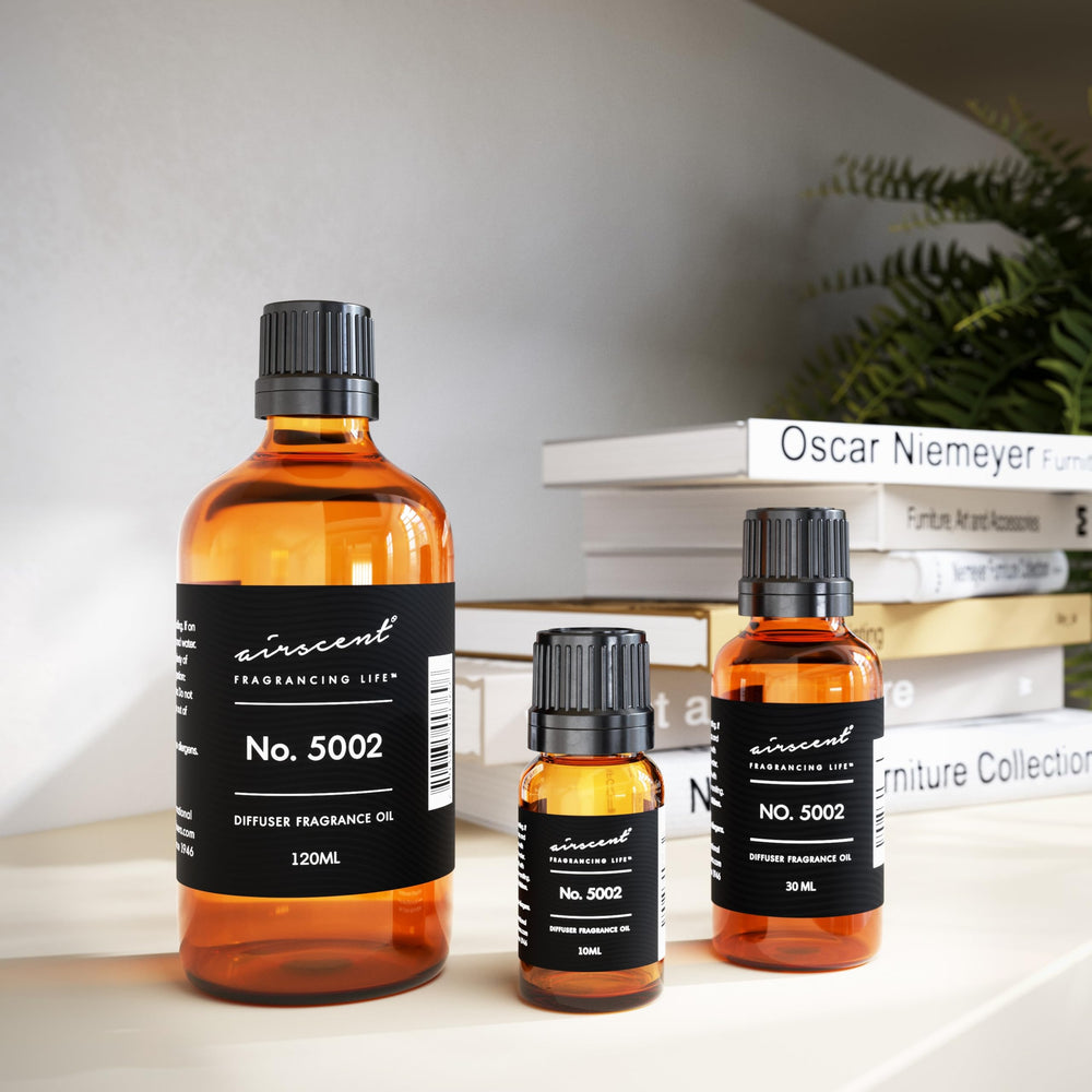 Close-up of AirScent Creed Aventus Inspired Diffuser Oil No. 5002 label