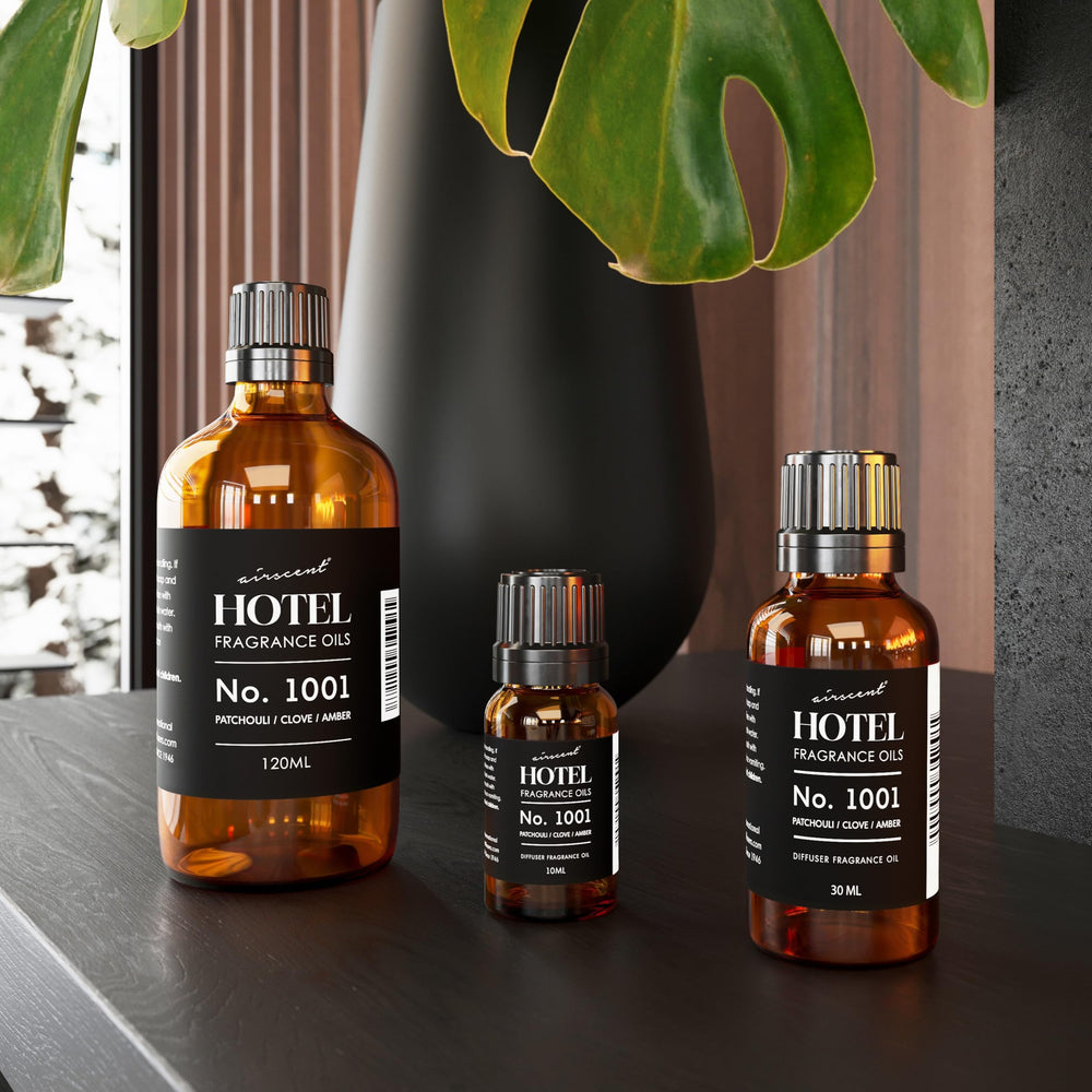 AirScent No. 1001 diffuser oil bottle beside packaging