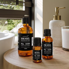 Diffuser oil bottle with packaging imagery showing Bergamot Cardamom Sandalwood scent