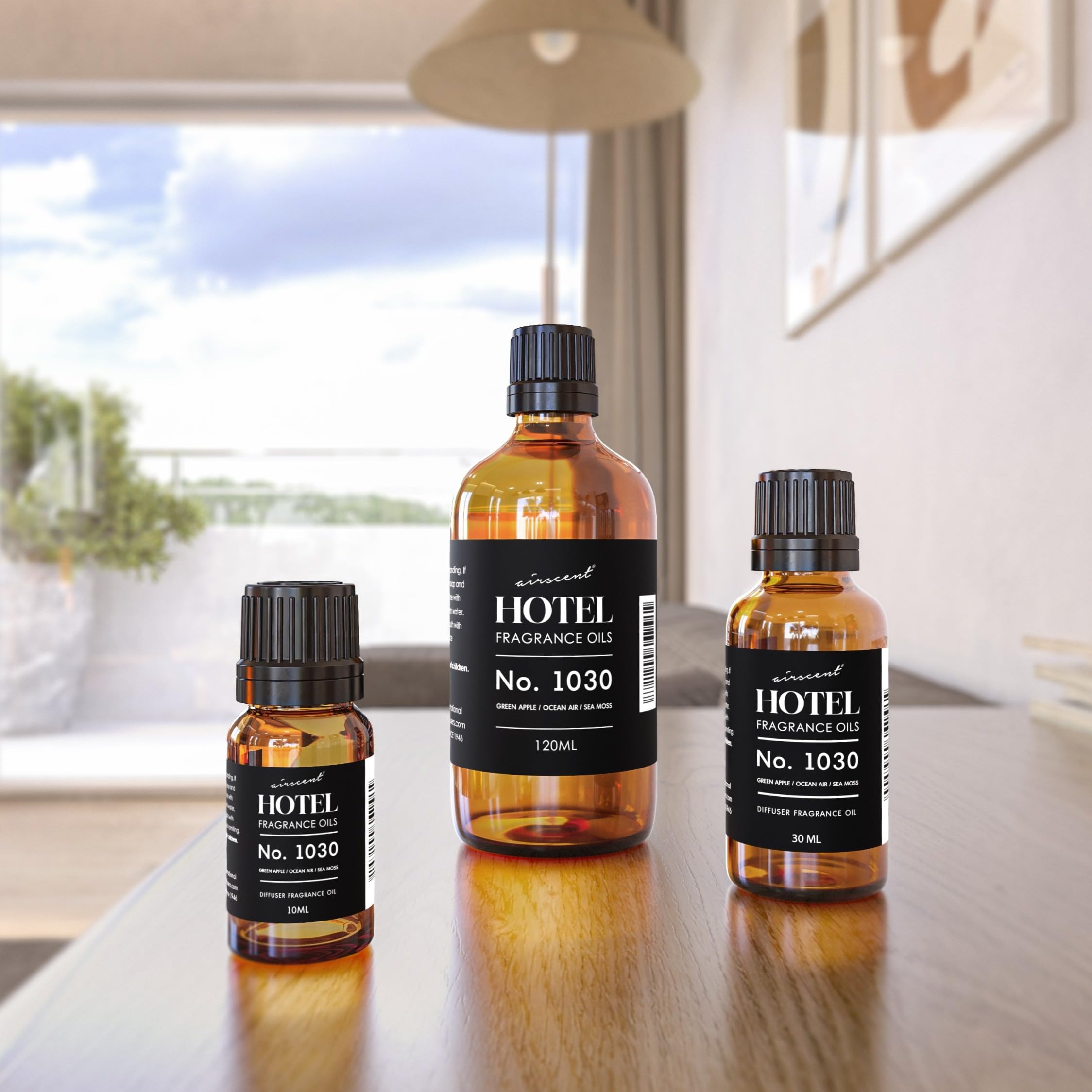 AirScent Hotel Diffuser Oil 1030 bottle in a cozy hotel lobby setting for ambience.
