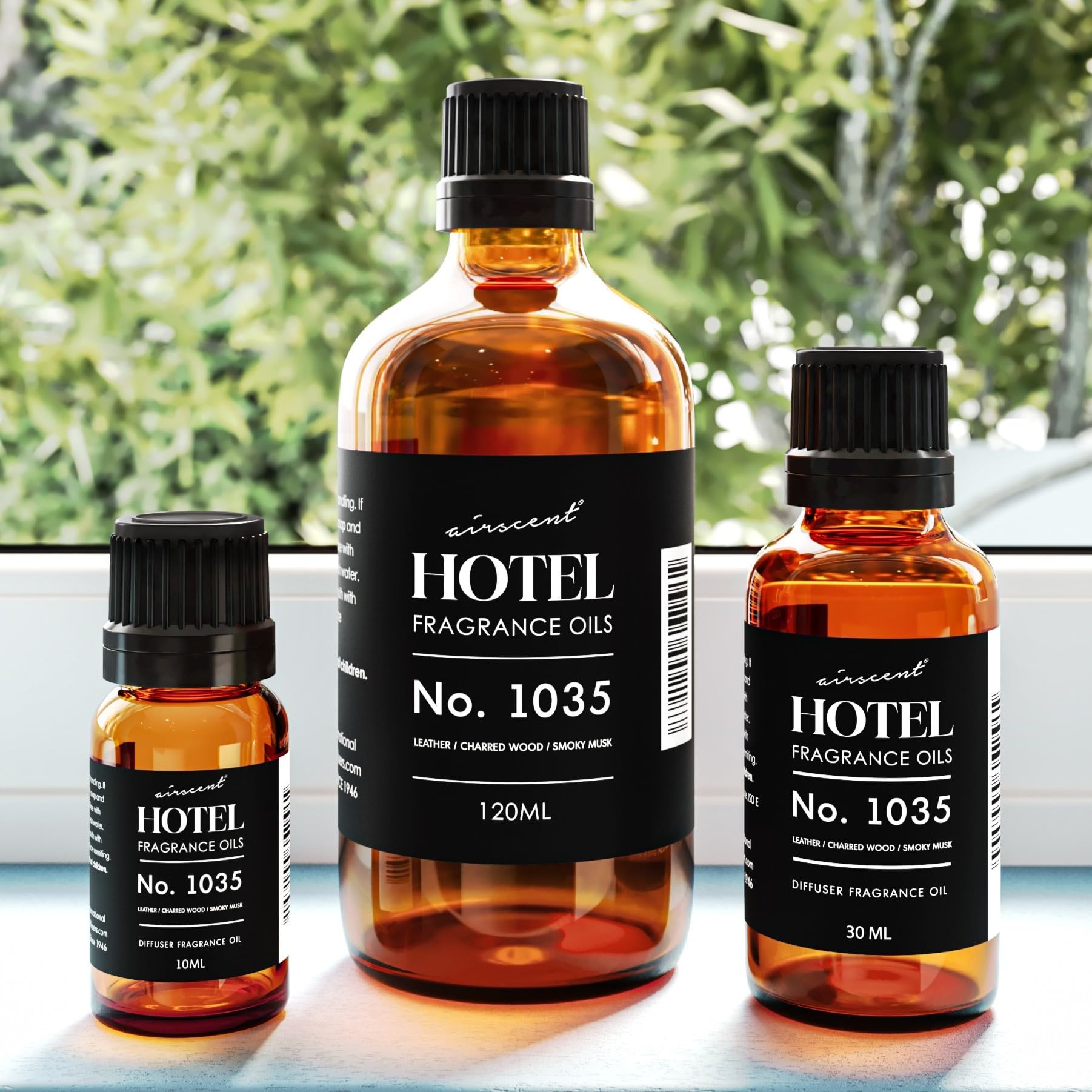 Glass bottle of AirScent No. 1035 diffuser oil on wooden surface
