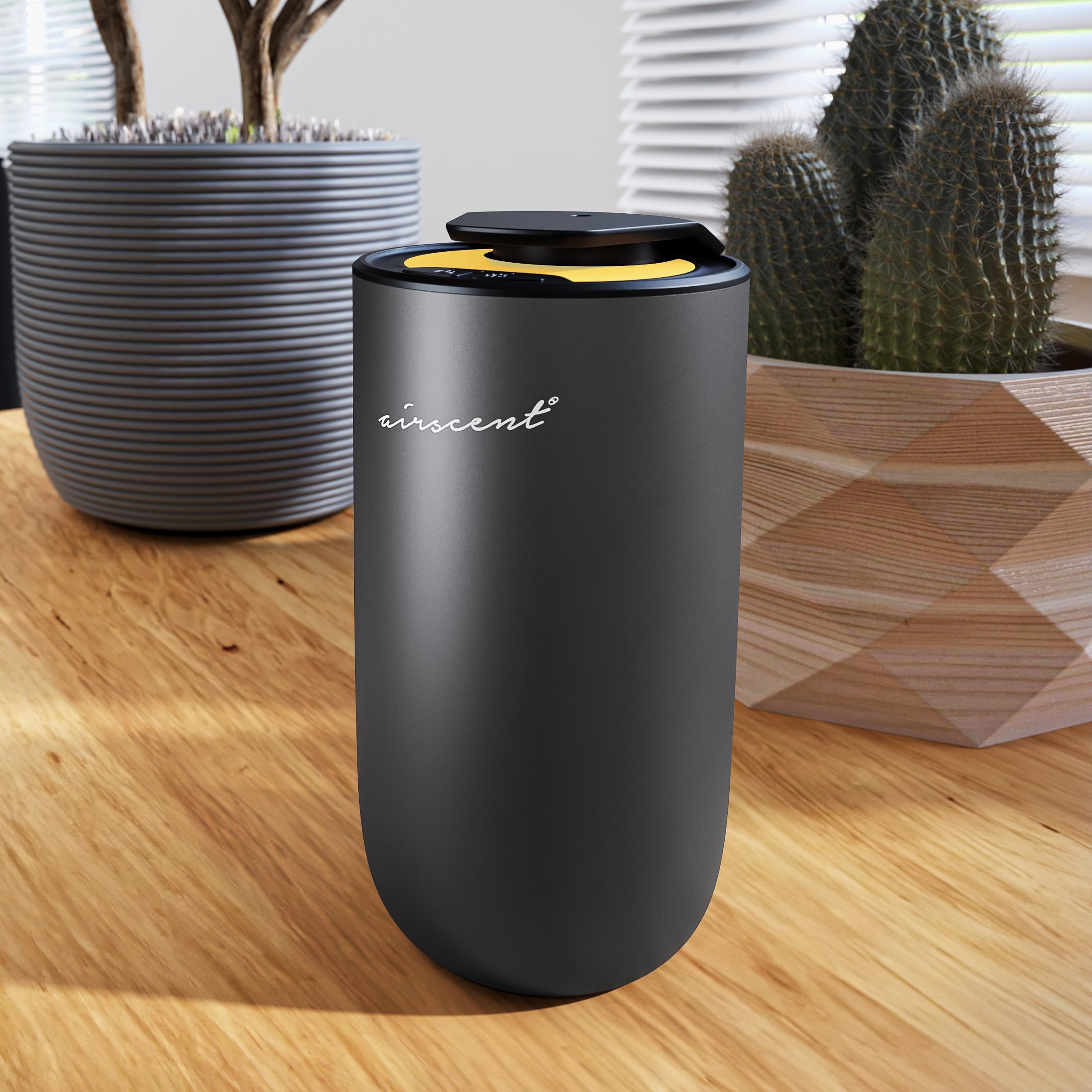Portable compact diffuser on a desk