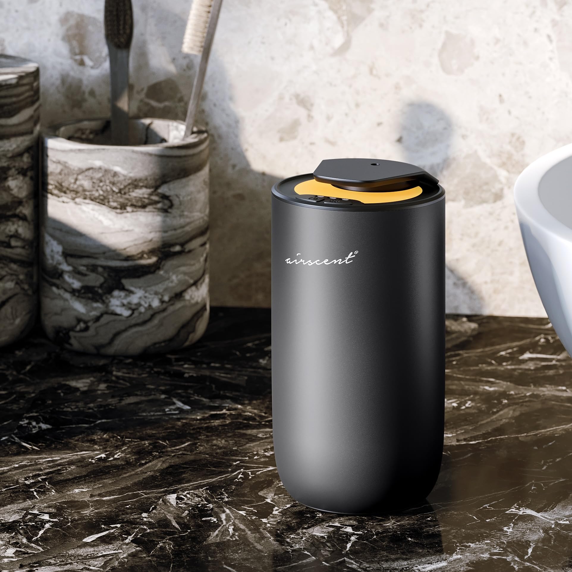Spa setting with AirScent diffuser in titanium black