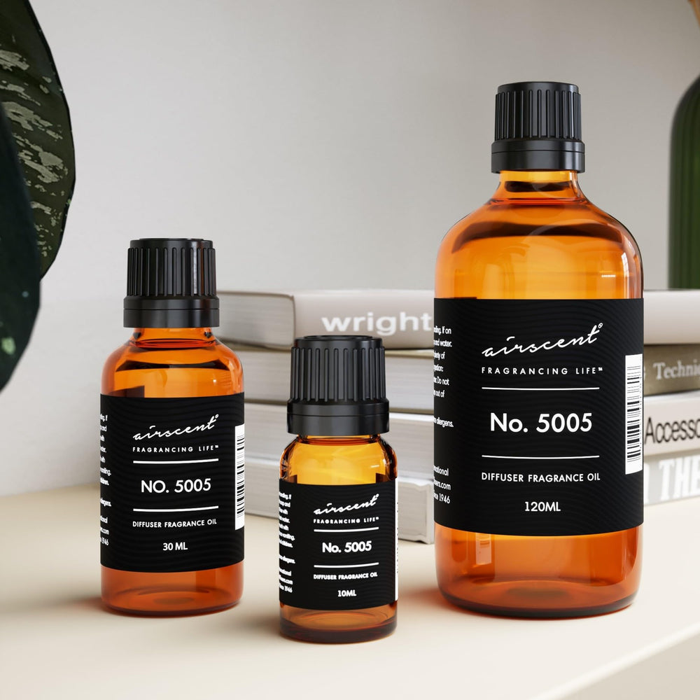 10 ml bottle of AirScent Oud Wood Diffuser Oil No. 5005 with packaging