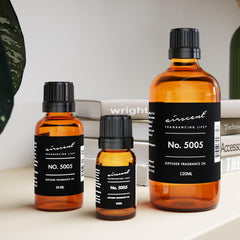 10 ml bottle of AirScent Oud Wood Diffuser Oil No. 5005 with packaging