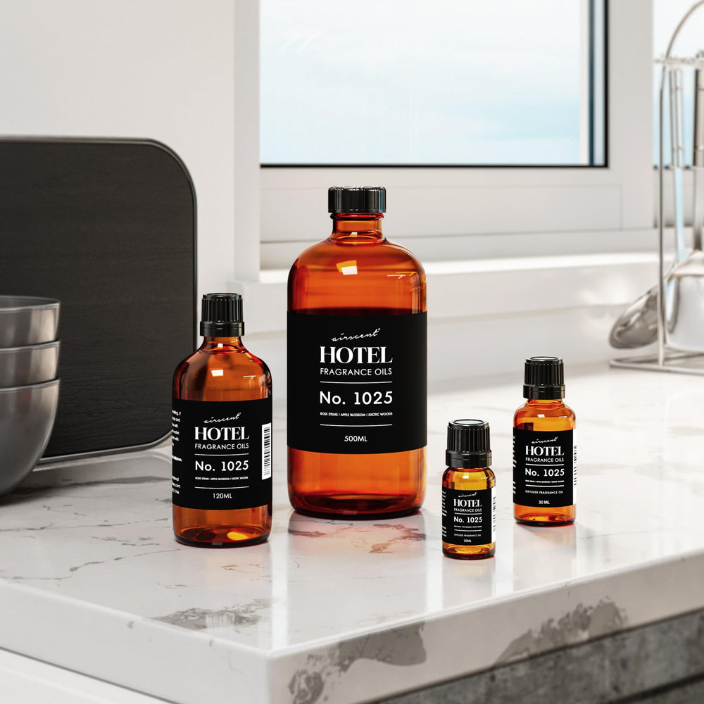 AirScent 30 mL bottle next to coin showing compact size and portability