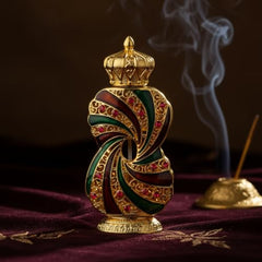 Unisex Tanasuk amber-vanilla attar bottle with amber liquid