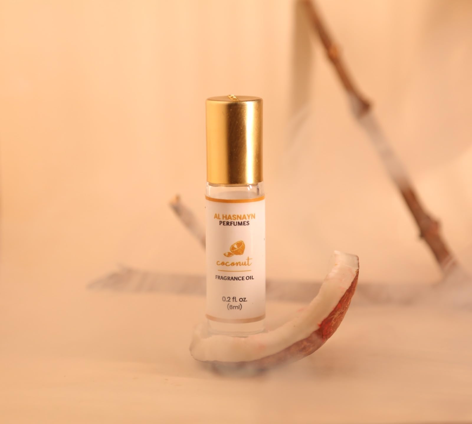 Packaging display of AL-HASNAYN Coconut Roll-On