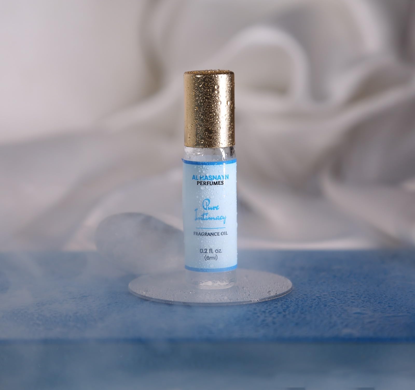 Travel-friendly compact perfume bottle