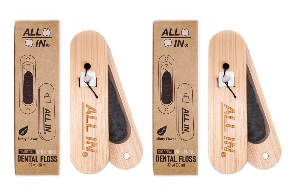 Front view of ALL IN Waxed Charcoal Floss with Refillable Holder