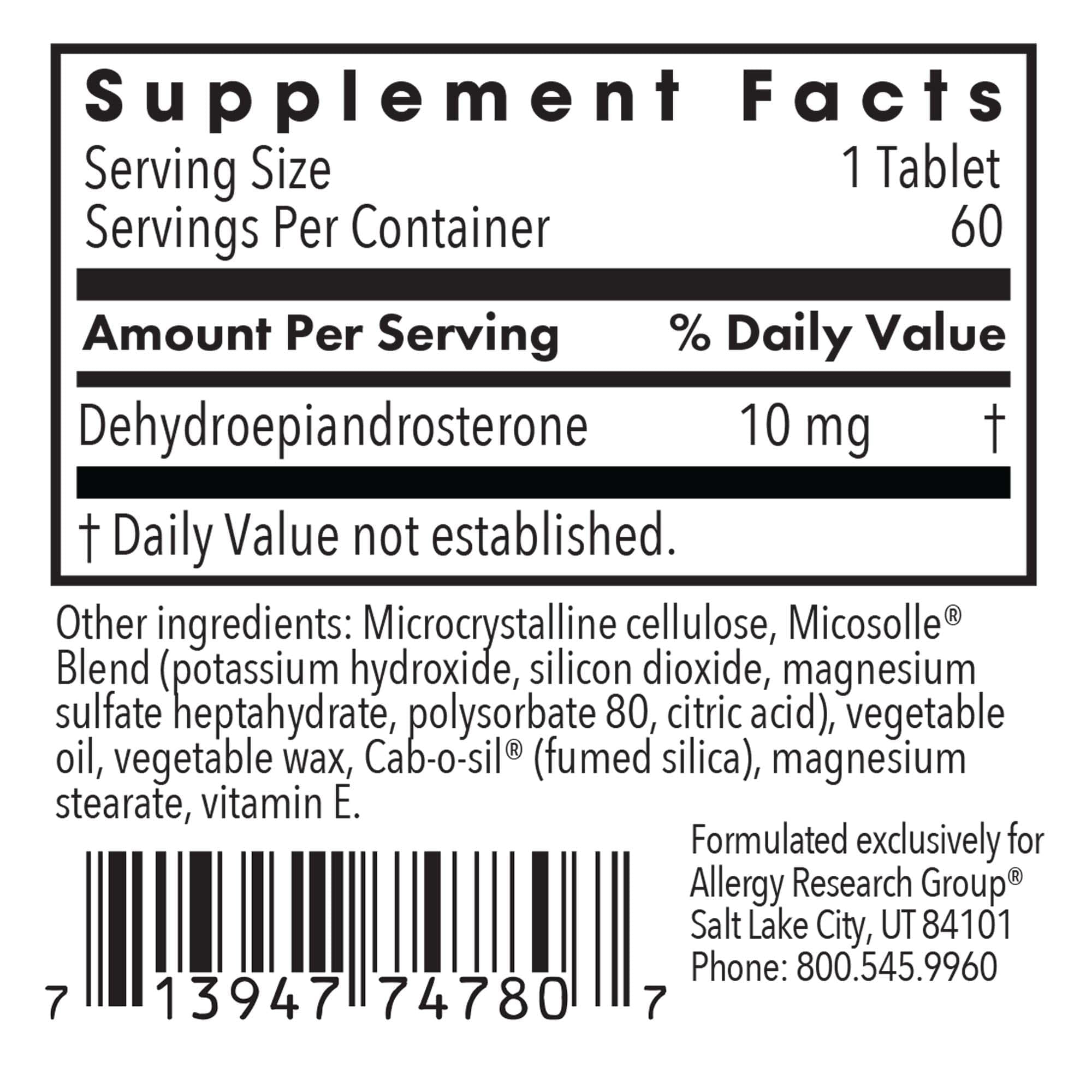 Close-up of DHEA tablets showing scored design