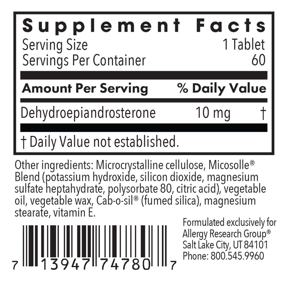 Close-up of DHEA tablets showing scored design