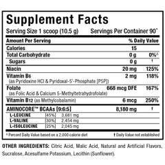 Blue raspberry BCAA powder dissolved in water in a glass with ALLMAX label