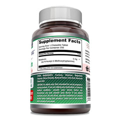 Close-up of strawberry-flavored melatonin chewable tablets