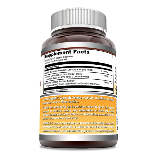 Close-up of turmeric curcumin veggie capsules