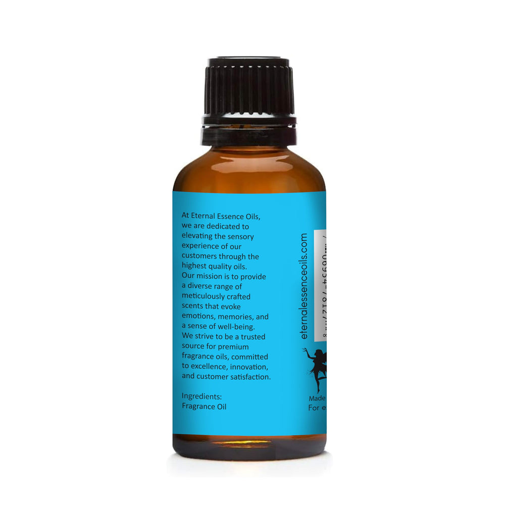 Amber glass bottle of Blue Cotton Candy fragrance oil with dropper