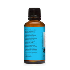 Amber glass bottle of Blue Cotton Candy fragrance oil with dropper