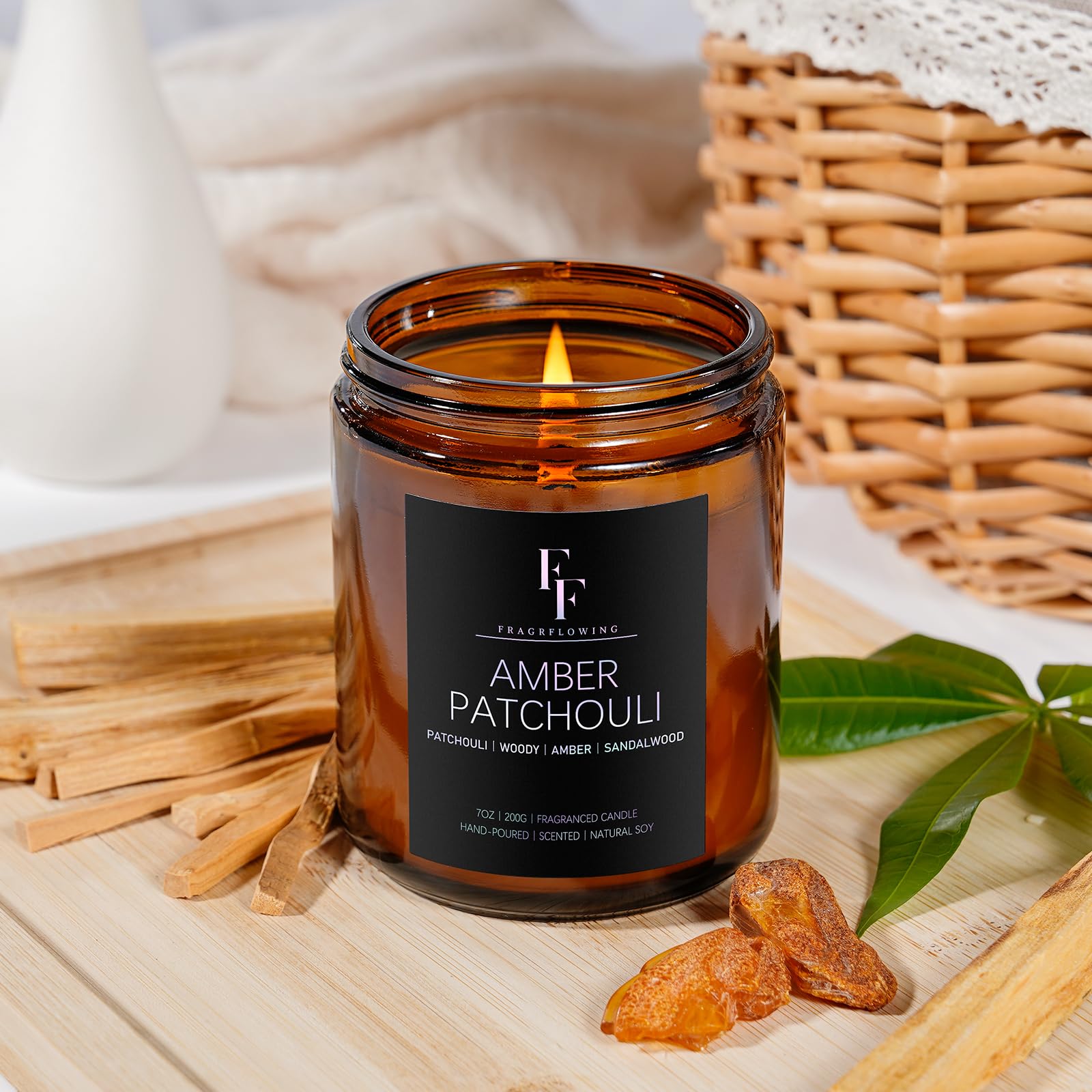 Gift box packaging featuring Amber Patchouli candle for gifting