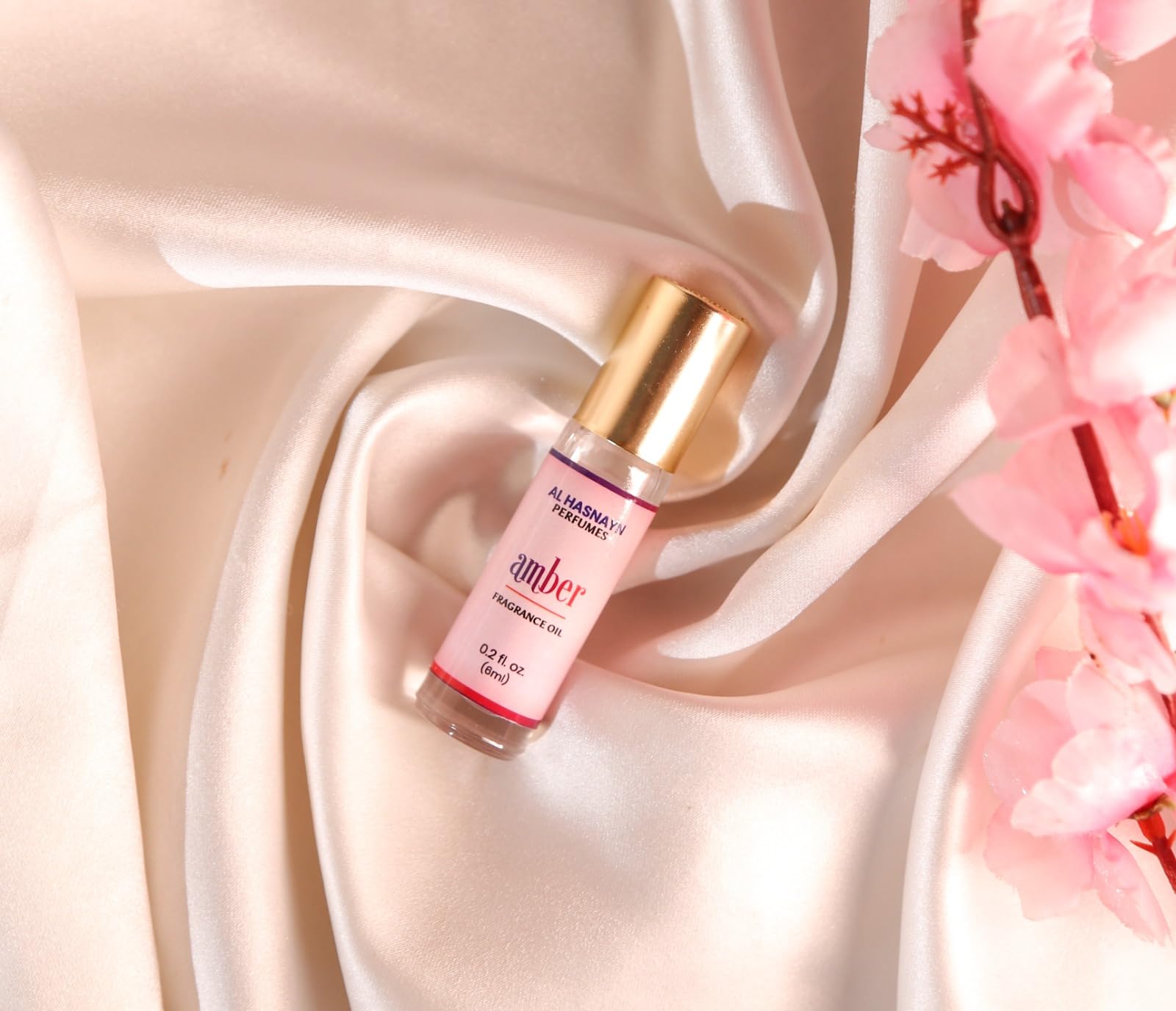 Lifestyle shot of unisex amber fragrance being worn