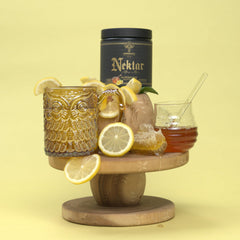 Serving idea: bottle beside a prepared shake and glass